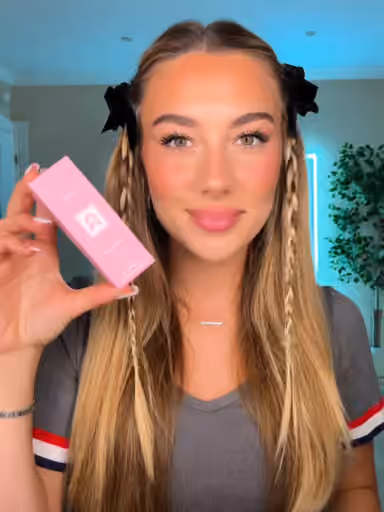 Soft ASMR tapping scene with a pink box and close camera framing.
